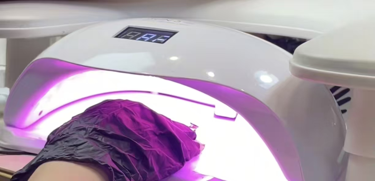 Nail care treatment under UV lamp